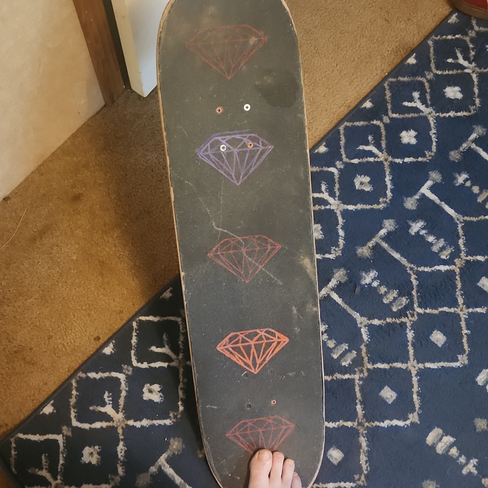Skateboard 8.25 inch deck 8 inch axle trucks 52mm wheels Bones bearings
